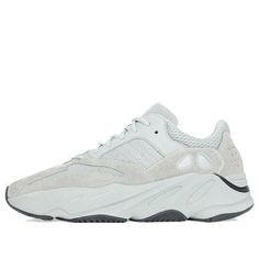 If you're looking for a comfortable, stylish sneaker that will turn heads, look no further than the Adidas Yeezy Boost 700! This unique sneaker features a light grey mesh upper with tonal suede and leather overlays. A sculpted midsole conceals full-length Boost cushioning, providing you with unmatched comfort all day long. The rubber outsole provides traction and durability, while the black accent adds a touch of style. (SNKR/Unisex/Low Top/Dad Shoes/Wear-resistant) Air Yeezy 2, Yeezy 2, Yeezy Boost 750, Adidas Yeezy 700, Adidas Models, Yeezy Sneakers, Unique Sneakers, Yeezy 700, Nike React