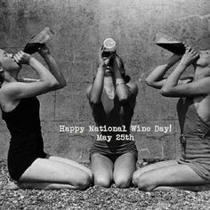 three women sitting on the ground with bottles in their hands