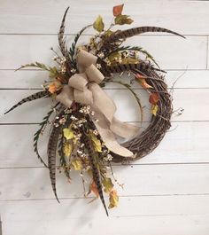 a wreath made out of twigs and leaves