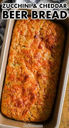 zucchini and cheddar beer bread in a baking pan with text overlay