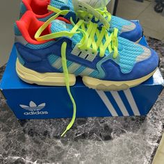 Adidas Zx Torsian New In Box Size 11 Women’s 9 Men’s Blue Turquoise Neon Yellow And Orange Adidas Blue Sneakers For Streetwear, Adidas Blue Sneakers With Cushioned Footbed, Adidas Zx, Shoes Adidas, Blue Adidas, Blue Turquoise, Neon Yellow, Turquoise Blue, Adidas Shoes