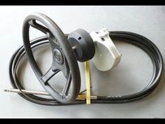 a steering wheel with a hose attached to it