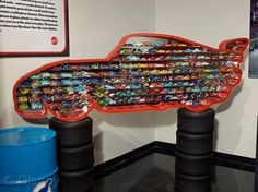 there is a fish shaped display on the wall