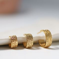 A little sophisticated, a lot glam - our Diamond Dusted Grand Huggies make a bold statement. Wider, bolder, and brighter than your classic hoop…yet still light enough for everyday wear. Available in 3 sizes. details + measures approximately 10 mm, 12mm, or 15mm in diameter + includes tension earnuts+ handmade with love in our Georgia studio availability handmade to order. ships in 5 - 14 days.current production timeline pressed for time? select the rush your order option to have your item made in 1 - 2 business days Unique Handmade Earrings, Fortune Cookie, Stacked Jewelry, 50th Gifts, Stacking Rings, Handmade Earrings, Ring Necklace, Personalized Jewelry, Customized Gifts