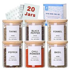 six jars filled with different types of spices