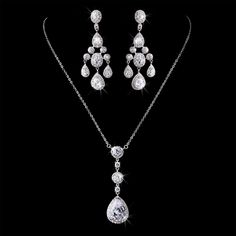 a necklace and earring set with diamonds