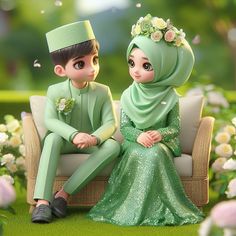 two people sitting on a couch in front of flowers and grass, one is wearing a green hijab