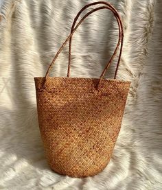 Are you looking for a versatile and stylish accessory to add to your everyday look? Get rattan bags with free shipping all over the USA. Shop now! Palm Leaf Basket Bag, Brown Jute Bag With Bamboo Handle, Brown Jute Bucket Straw Bag, Natural Woven Bucket Bag For Daily Use, Natural Fiber Straw Bag With Bamboo Handle, Eco-friendly Shoulder Bag With Bamboo Handle For Daily Use, Handwoven Straw Bucket Shoulder Bag, Trendy Handwoven Brown Shoulder Bag, Palm Leaf Straw Bag With Bamboo Handle