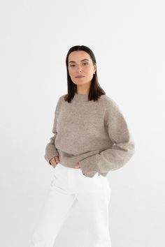 This oversize style wool sweater is made from 100% soft, thick wool with tweed structure. Available in several colors: Beige (on the model), Light gray, Caramel beige, Brown, Orange and White. Tweed yarn has mélange structure, which means that Light gray, Beige, and Caramel beige colors have speckles in the same color palette as the main color, whereas Brown, Orange and White have contrasting speckles. Brown has orange and fuchsia speckles, Orange has light green speckles and White has very gent Lambswool Sweater For Workwear In Fall, Classic Recycled Wool Sweater For Fall, Fall Workwear Lambswool Sweater, Fall Lambswool Sweater For Workwear, Fall Lambswool Workwear Sweater, Fall Lambswool Sweater For Work, Beige Lambswool Sweater For Fall, Everyday Wool Sweater For Fall, Long Sleeve Recycled Wool Sweater For Fall