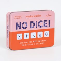 an orange and pink tin box with dices on it that says no dice can you try not scoring points for a change?