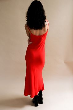 Shani Leo floor length maxi slip dress in red crepe. Cut on the bias to drape over your body in all the right places. Adjustable straps and beautiful raw hem. size 1 - 2/4 size 2 - 6/8 size 3 - 10/12 100% up-cycled rayon. #theplanetwillthankyou Sustainably and ethically produced in a family run factory in downtown Los Angeles, CA. Model is 5'9" and wearing a size 1. PIPE AND ROW Red V-neck Maxi Dress With Side Slits, Red Maxi Length Slip Dress For Evening, Red Bias Cut Slip Dress For Summer, Red Bias Cut Slip Dress For Evening, Red Bias Cut Maxi Dress For Evening, Red Sleeveless Maxi Dress With Bias Cut, Red Sleeveless Bias Cut Maxi Dress, Sleeveless Bias Cut Red Maxi Dress, Red Sleeveless Bias-cut Maxi Dress