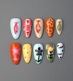 ❤Handmade❤ ❤Unique❤ ❤Reusable❤ ❤Hello, dear. Greetings and welcome to my store. Hope you find a style you like❤ ❤About Product❤ This colorful summer nail art is incredibly cute and fun! The flower, vegetable, and fish patterns on the press-on nails add a lively touch, making the nails burst with vibrant colors and a hint of playfulness. Such short almond nail art designs are full of joy and imagination. Wearing these nails is sure to bring a cheerful mood and showcase your personality charm. ❤Materials: gel❤ I only work with high-quality materials to create sturdy & long-lasting luxury press on nails that you can trust on. ❤Size:❤ XS: 15mm, 12mm, 13mm, 11mm, 9mm S: 16mm, 13mm, 14mm, 12mm, 9mm M: 17mm, 13mm, 14mm, 12mm, 10mm L: 18mm, 14mm, 15mm, 13mm, 11mm If you would like a custom size, p Short Almond Nail Art, Almond Nail Art Designs, Nail Short Almond, Fish Nail Art, Fish And Flowers, Fish Nails, Nail Short, Almond Nail Art, 3d Fish