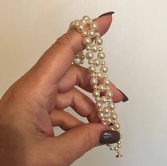 "Gorgeous creamy Swarovski pearls in 4mm and 6mm sizes woven into a diagonal geometric pattern creates a stunning bracelet when a more formal look is required. This is a classic bracelet that will pair beautifully with any other color in your closet, and looks especially great against black.   Summer wedding? This is the perfect gift for a bridesmaid or mother of the bride. Additional quantities are available on request. Click on 'contact the owner' and let me know how many you need. Depending on volume, a custom order will be completed within 5 days.   Pearls are Swarovski and are strung on monofilament for strength and flexibility. A gold plate magnet closure provides secure hold without the fuss of a lobster clasp.  Total length is 7\". Width is 3/4\". Bracelet will arrive with speciall Formal Pearl Beaded Bracelets, Formal Pearl Beaded Bracelet, Classic Beaded Bracelets For Formal Occasions, Elegant Cream Pearl Bracelet As A Gift, Elegant Cream Pearl Bracelet As Gift, Elegant Cream Pearl Bracelet Gift, Elegant Cream Bracelet For Formal, Elegant Cream Bracelet For Formal Occasions, Elegant Cream Beaded Bracelets With Round Beads