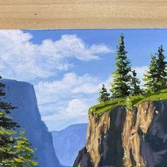 an oil painting of mountains and trees on the side of a cliff with water below