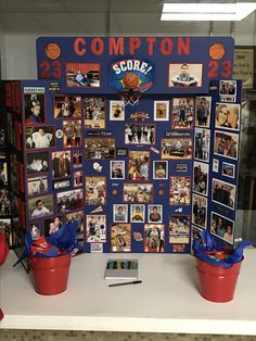 a bulletin board with basketball pictures and photos on it, along with red buckets