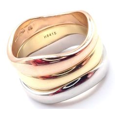 About This Piece: This is an Cartier 18K Tri-Color Gold Three-Stacking Puzzle Band Ring in size 53. The ring features three stacking bands in rose, yellow, and white gold that fit together like a puzzle. The Trinity design represents the three stages of a relationship: friendship, love, and fidelity. Cartier is known for their exceptional quality and timeless designs, and this ring is no exception. It is a beautiful and unique piece of jewelry that will make a statement on any occasion and is su Puzzle Band, Tri Color Gold Rings, Stages Of A Relationship, Stacking Bands, Friendship Love, Gold Band Ring, Rose Yellow, Vintage Band, Cartier Ring