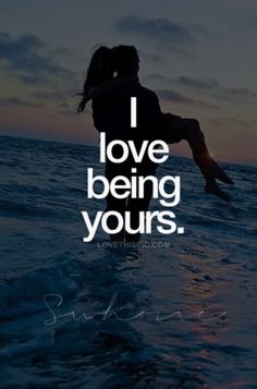 a person jumping into the water with a quote above them that says i love being yours