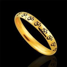 OM AUM Wedding Ring Gold Eternity Om Band Religious Wedding Black Painting Unisex Antique Finish Anniversary The OM (or AUM) sign is the main symbol of Hinduism. Most religions indicate that creation began with sound-- In the beginning was the word... For the Hindus & Buddhists, Om is the primordial sound, the first breath of creation, the vibration that ensures existence. Om sign signifies God, Creation, & the One-ness of all creation. This band is made of 14k yellow gold and is 2.7mm w Spiritual Engraved Wedding Ring, Symbolic Black Jewelry For Wedding, Symbolic Engraved Wedding Ring, Symbolic Wedding Engraved Ring, Symbolic Black Wedding Jewelry, Spiritual Adjustable Engraved Wedding Ring, Adjustable Spiritual Engraved Wedding Ring, Adjustable Spiritual Engraved Ring For Wedding, Adjustable Engraved Spiritual Ring For Wedding