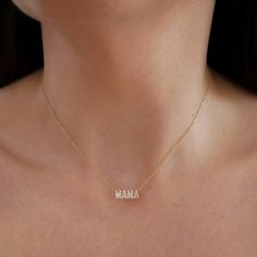 The Diamond Mama Necklace makes for the perfect gift for all moms and mom-like figures. Featuring .11 carats of diamond set in block letters spelling out "mama," this necklace is a sweet, sparkly addition to any layer. Mother's Day Diamond Necklace, Glass Nail File, Mama Necklace, Diamond Initial Necklace, Glass Nails, Block Lettering, Diamond Bracelets, Initial Necklace, Chain Lengths