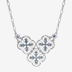 Enhance your wardrobe with this silver-tone filigree necklace. Sparkling sapphire color crystals rest in the petals of this effortlessly glamorous flower necklace.Jewelry Closure: Lobster ClaspStone Cut: RoundMetal Color: Silver ToneChain Length: 16 InchExtender Length: 3 InchChain Construction: FigaroCare: Wipe CleanStone Type: 17 CrystalMetal: AlloyNecklace Type: Collar NecklacesCountry of Origin: Imported Silver Crystal Necklace With Intricate Design, Silver Necklace With Intricate Crystal Design, Elegant Blue Filigree Necklace, Blue Filigree Necklace For Wedding, Collar Necklaces, 1928 Jewelry, Filigree Necklaces, Sapphire Color, Crown Jewels