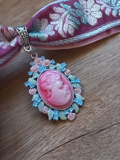 This Victorian inspired romantic pink  and light blue velvet choker supplemented with Victorian Ladies hand painted cameo pendant are very attractive and posh accents for your special occasions or summer wedding. Can be used as accessory for any kind of dresses - evening or casual, cocktail, sleeveless, long sleeve, bustier style dress or top. Also will look well with any kind of jackets. Detailed, hand crafted and carefully designed whit love and care! Height----1 inches (3 cm) Necklace length- Pink Cameo Necklace For Gifts, Pink Vintage Choker Jewelry, Pastel Goth Choker, Goth Choker, Hand Painted Pendant, Ribbon Choker, Victorian Pendants, Victorian Lady, Velvet Choker