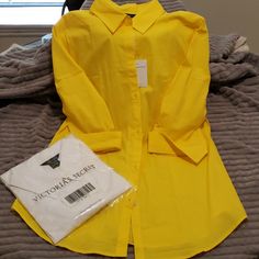 Brand New (Without Tags) Never Worn Victoria Secret Button Up Shirt (Sold Separately). One Yellow And One White. Shirts Are 96% Cotton And 4% Spandex. Yellow Collared Shirt For Work, Trendy Yellow Shirt For A Day Out, Yellow Shirt For Spring Day Out, Yellow Blouse With Button Closure For Day Out, Yellow Spring Shirt For Work, Yellow Spring Shirt For Workwear, Yellow Shirt For Spring Workwear, Yellow Button Blouse For Day Out, Casual Yellow Shirt For Daywear