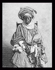 an old black and white photo of a woman sitting in a chair with her hands on her hips