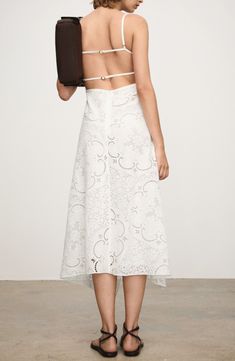 Airy embroidered eyelets enliven this breezy cotton midi designed with a strappy back and a sleek asymmetric hem. Square neck Adjustable straps Lined 100% cotton Dry clean Imported Spring Midi Dress With Cutwork Hem, Summer Eyelet Midi Dress, Sleeveless Eyelet Midi Dress, Spring Sleeveless Eyelet Midi Dress, Sleeveless Eyelet Midi Dress For Spring, Chic Eyelet Midi Dress, Spring Eyelet Midi Dress, Elegant Eyelet Dress For Summer, Elegant Summer Eyelet Dress