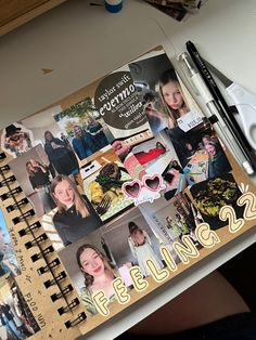 an open notebook with photos and writing on it