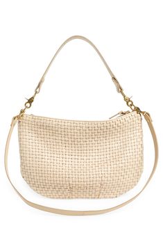 Ideal for everyday wear, this woven-leather carryall that holds the out-and-about must-haves can be worn as a crossbody or shoulder bag. Removable crossbody and shoulder straps Cotton lining Leather Imported Latinx Owned and Founded Everyday Woven Leather Hobo Bag, Everyday Leather Woven Shoulder Bag, Versatile Shoulder Bag With Intrecciato Weave For Travel, Versatile Intrecciato Weave Shoulder Bag For Travel, Everyday Woven Leather Hobo Shoulder Bag, Versatile Everyday Bag With Woven Leather, Modern Woven Leather Hobo Bag For Travel, Versatile Everyday Woven Leather Bag, Modern Travel Hobo Bag With Woven Leather