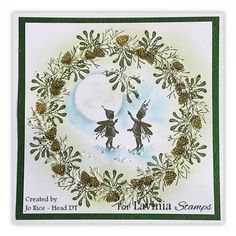 a christmas card with two tinkerbells and pine cones in the center, on a white background