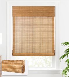 a bamboo blind in front of a window