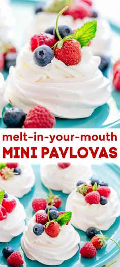 mini pavlovas with whipped cream and berries on top, sitting on a blue plate