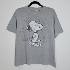 Snoopy Seasons T-Shirt Vtg Snoopy Seasons Mens Size L Faded Graphic Print T-Shirt In Great Condition Condition: 10/10 Dm For Any Questions Size L Machine Washed 100% Cotton #Cartoon #Penuts #Snoopy #Cartoontees #Vintagecartoon Charlie Brown Music, Peanuts Shirts, Peanuts T Shirts, Charlie Brown Halloween, Snoopy Shirt, Snoopy T Shirt, Stitch Shirt, Gamer T Shirt, Patriotic Flag