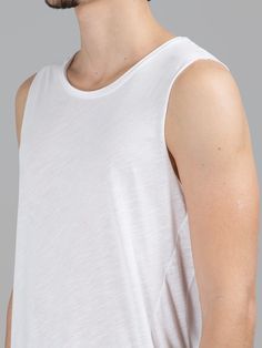 PLEASE KEEP IN MIND **Item takes up to 1-2 business weeks for production and 100% handmade ****-**WHITE and BLACK ASYMMETRIC T-SHIRT - ROUND NECK - ASYMMETRIC CUT - SLEEVELESS - MADE IN TURKEY ** Men in the picture wearing size : LARGE - 1/80 Height 79 kgFit True to Size - So pick up your actual size.**CUSTOM ORDER ACCEPTEDsize Measurements: - CM -XS S M L XL 2XL 3XL 4XL 5XLWaist : 46 48 50 52 54 56 58 60 62Lenght : 87 88 90 92 94 95 97 98 100:)Thank you for visiting my shop ^^SMILE ALWAYS^^ White Stretch Muscle Tee Casual Style, White Stretch Muscle Tee With Crew Neck, Casual Plain Tank Top For Summer, Plain Stretch Tops For Summer, White Stretch Sleeveless T-shirt, Cotton T-shirt With Curved Hem For Summer, White Crew Neck Vest Top, Casual Summer Muscle Tee With Dropped Armholes, White Relaxed Fit Crew Neck Tank Top