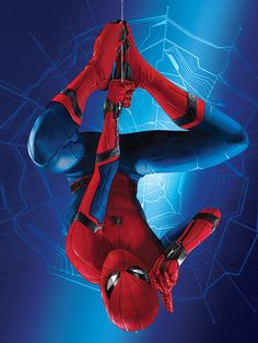 the amazing spider - man is hanging upside down on his back in front of a blue background