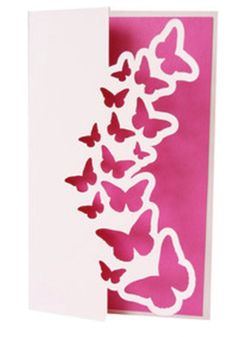 a card with pink and white butterflies on it