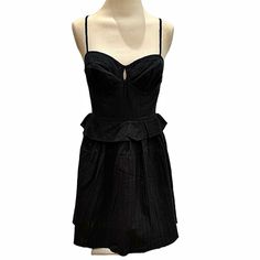 Step Out In Style In This Comfortable Cute Black Mini Dress From Betsey Johnson. The Dress Features A Sweetheart Neckline, Textured Pattern, And Ruffle Peplum At The Waist. The Adjustable Straps Fit Perfectly To Your Shape And Size. The Cool Cotton Construction Make This The Perfect Festival Dress, Graduation, Date Night Or Just About Anywhere You Need A Little Black Dress. Throw On Some Cowboys And A Cowboy Hat And Yeehaw You’re Ready To Rope Em In. Sweetheart Neckline Pullover Style Adjustable Lined Mini Dress With Ruffled Straps For Date Night, Spaghetti Strap Corset Dress With Ruffles For Night Out, Spaghetti Strap Ruffled Corset Dress For Night Out, Spaghetti Straps Corset Dress With Ruffles For Night Out, Spaghetti Straps Corset Dress For Night Out, Coquette Mini Dress With Fitted Bodice For Night Out, Black Ruffled Corset Dress For Date Night, Black Fitted Dress With Ruffled Straps, Black Mini Dress With Ruffled Straps For Night Out