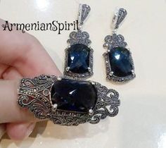 Navy blue SET silver marcasite jewelry armenian handmade very big ring very long earrings with blue stone Royal jewelry wedding dark blueYou can buy ring and earrings separately and in a set.In a set it will be cheaper.WE MAKE THIS SET IN ANY COLOR (stone): RED, BLUE, BLACK, BROWN, etc.RING:Weight: 11.8 gramsEARRINGS:The weight is approx. 14.6 gramsThe length approx.: 5 cm = 2 inchThe stone is lab topaz.Shipping time:Europe 3 weeks.USA and other countries 3 weeksI don`t accept returns and  excha Traditional Silver Jewelry For Evening, Antique Hand Set Silver Jewelry, Elegant Pendant Earrings With Stone Setting, Handmade Elegant Sapphire Jewelry, Handmade Blue Jewelry For Evening, Evening Jewelry With Oxidized Silver Finish, Elegant Oxidized Jewelry For Parties, Elegant Oxidized Finish Jewelry For Parties, Silver Jewelry With Oxidized Finish For Evening