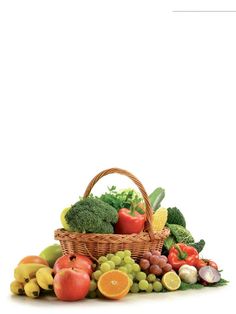 a basket filled with lots of different types of fruits and vegetables next to each other