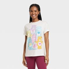 Step out in style with the Women's Care Bears Short Sleeve Graphic T-Shirt - Off-White. Made from soft material with a crew neck and short sleeves, this t-shirt keeps you cool and relaxed. It has a colorful Care Bears graphic print to add a fun touch. Express your unique style with the Women's Care Bears Short Sleeve Graphic T-Shirt - Off-White. Playful Crew Neck T-shirt For Loungewear, Playful White T-shirt For Loungewear, White Pre-shrunk T-shirt For Loungewear, Playful Short Sleeve T-shirt For Streetwear, Playful Pre-shrunk Crew Neck T-shirt, Cute Crew Neck T-shirt For Loungewear, Cute White Short Sleeve T-shirt, Playful Spring T-shirt For Loungewear, Playful Relaxed Fit Crew Neck T-shirt