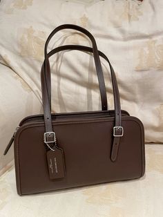 Swing zip in maple/silver #coach #shoulderbag #fashion #accessories #coachbag #purses #trending #leather Coach Swing Zip Bag Outfit, Swing Zip Coach, Cute Vintage Bags, Coach Brown Bag, Coach Bag Brown, Coach Swing Zip, Dark Academia Luxury, Dark Academia Bag, Affordable Designer Bags