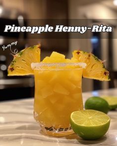 the pineapple henny - rita cocktail is ready to be served