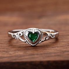 Solid 925 Sterling Silver 4mm May Birthstone Emerald Green Color Heart CZ Bezel Set Rope Filigree Baby Girls Childrens Teens Ring Jewelry ▷Gift Box Included ▷7mm Height ▷Size 1 - 12 Available ▷925 Sterling Silver (not plated or filled) ▷925 Stamp Authenticity ▷High-Quality Cubic Zirconia Used https://www.etsy.com/shop/TrendyRing Teen Ring, Emerald Green Color, Color Heart, May Birthstone, Colorful Heart, Ring Jewelry, Jewelry Gift Box, Bezel Setting, Solid 925 Sterling Silver