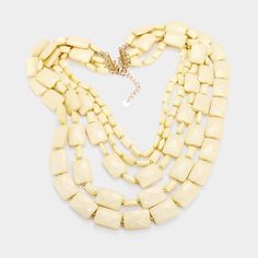 Ivory Multi Strand Resin Rectangle Bead Necklace SetItem: Necklace & EarringsBrand: V Foxy CollectionColor: Ivory, Gold Length: 21" + 3" Long Decor Size: 5" LongEarrings: 2.5" LongFastening: Lobster Clasp Metal: Alloy, Lead & Nickle FreeMaterials: Metal, Beads, Resin Theme: Fashion All Measurements are Approximate Sold As One Individual Necklace & 1 Pair of Matching Earrings Cheap Gold-tone Multi-strand Necklace, Necklace Sizes, Metal Beads, Multi Strand, Bead Necklace, Matching Earrings, Necklace Set, Lobster Clasp, Chain Necklace