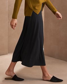 The right skirt for all seasons, with pull-on ease, flattering swing, and a modern length. Irresistibly soft, lightweight, and fluid in TENCEL™ Lyocell jersey with a touch of stretch for a very easy fit.  Exclusive. By EILEEN FISHER.  A-line silhouette.  Elastic waist. Sleek Midi Flowy Skirt, Sleek Flowy Midi Skirt, Versatile Relaxed Fit Skirt For Fall, Stretch Viscose Midi Skirt, Relaxed Viscose Skirt For Fall, Versatile Relaxed Rayon Skirt, Versatile Rayon Relaxed Fit Skirt, Versatile Rayon Skirt, Flowy Rayon Skirt For Workwear