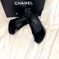 These Stunning Chanel. Featuring A Patent Leather With Perfect Size Heal For Any Occasion Ranging From Parties, Cocktail Events, Come In A Size 6 These Shoes Are Stunning And Perfect Condition. Like Brand New Is In A Perfect Condition. Don't Miss Out On This Elegant And Timeless Addition To Your Shoe Collection. Metal Cc Logo Pearls Atop Each Heel Original Box, Dust Bag. Luxury Black Wedge Heels, Designer Formal Heels With Medium Width, Luxury Wedge Heels For Office, Elegant Wedge Heel For Formal Occasions, Elegant Wedge Heel Heels For Formal Occasions, Luxury Office Wedge Heels, Elegant Wedge Heels For Formal Occasions, Designer Patent Leather Closed Toe Heels, Designer Black Wedge Heels