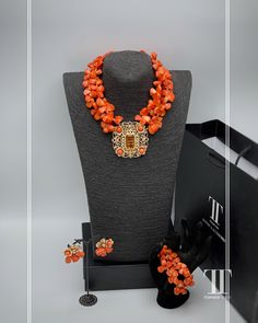 Description Our stunning Coral Bead Necklace and African pendant set are a perfect choice for anyone searching for a unique and eye-catching piece of jewellery. This ethnic necklace is ideal for fashion-forward individuals, who want to add a touch of elegance to their ensemble. Crafted from high-quality coral beads, this African beaded necklace features an intricate design that is a perfect reflection of the rich African cultures and traditions. With this fabulous necklace, you're sure to stand How To Make African Jewelry, Chip Bead Jewelry, African Wedding Jewelry, Handcrafted Beaded Jewelry, Hand Beaded Bag, Beautiful Beaded Jewelry, African Traditional Wedding, Coral Beads Necklace, Delicate Necklaces