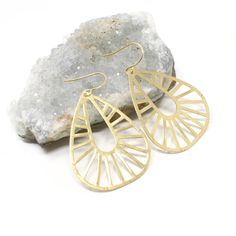 A classic teardrop shape with geometric accents creates this sweet pair. Earrings measure 1.5 inches in length. Charms are brass. Ear-wires are lead-free, nickel-free gold-plated. New Love, Ear Wires, Gold Plate, Charms, Plating, Brass, Gold