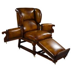 a brown leather reclining chair and ottoman